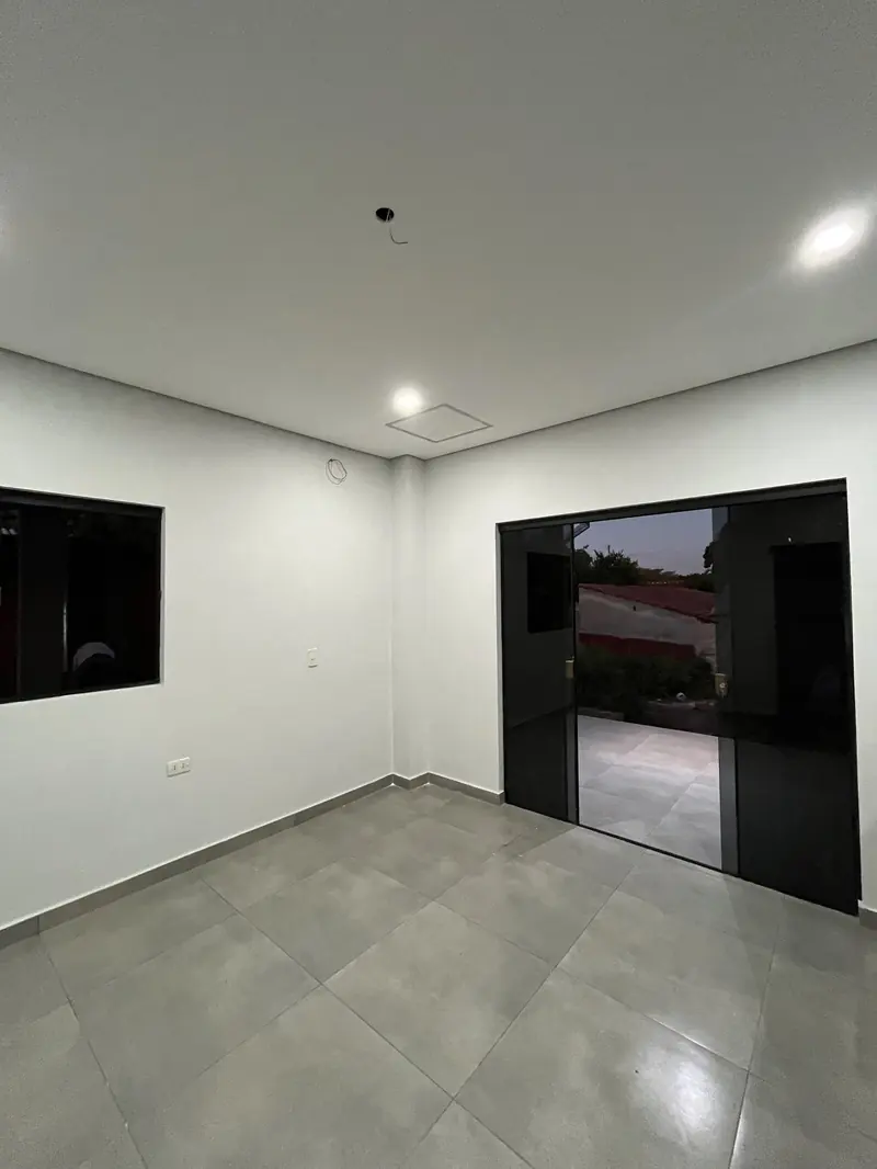 Ambiente interior con television, vivienda Mile San Lorenzo - OGA Constructora